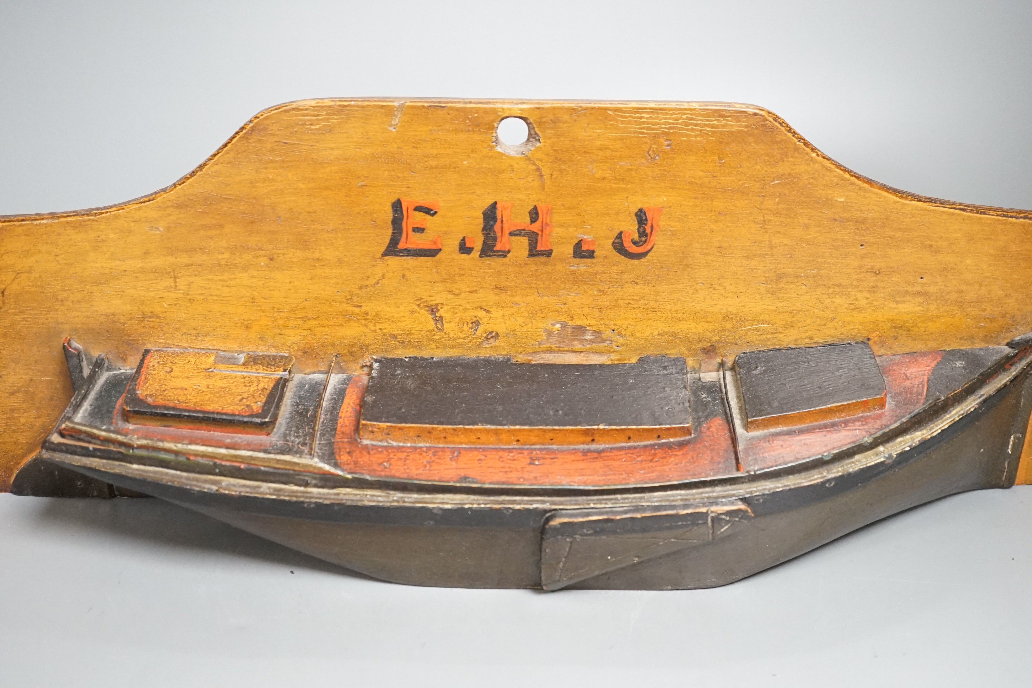 A painted wood half-block boat model ‘E.H.J’ 53.5cm